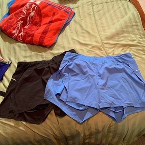 2 pairs of running shorts with spandex inside
